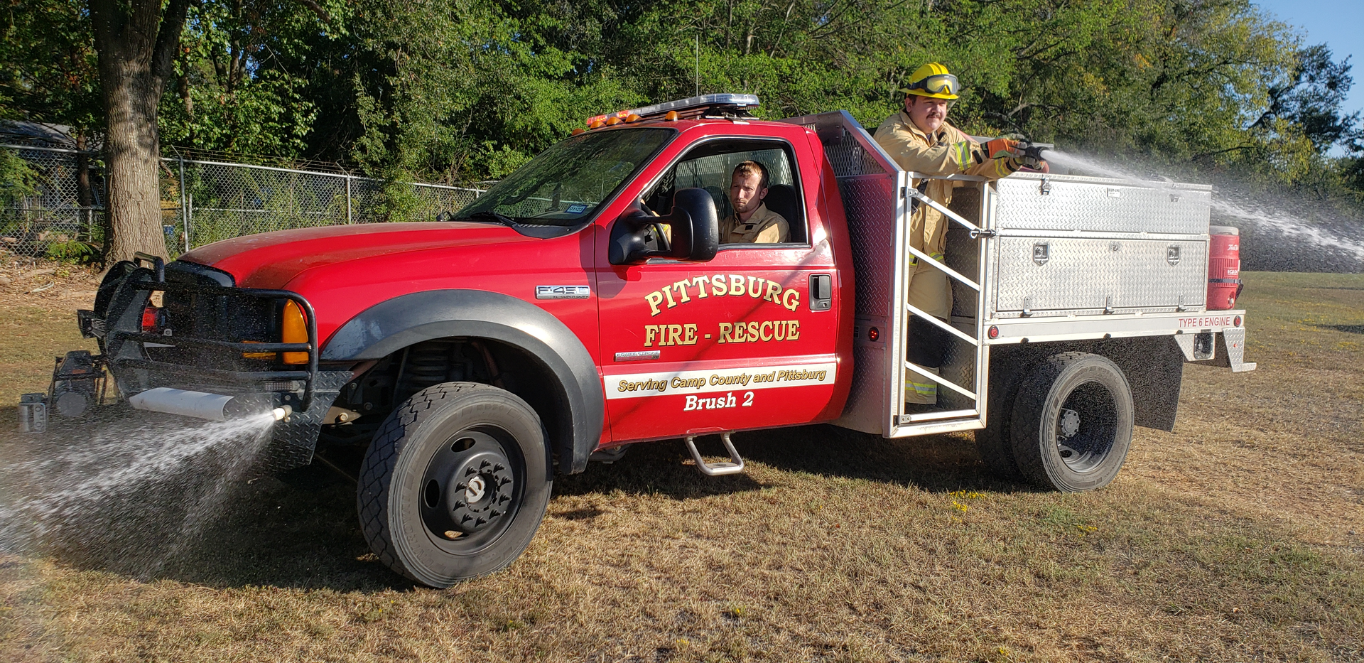 Attack platforms and short sections of hose near the cab are common in the design of wildland rigs for departments in Texas and other Plains states.