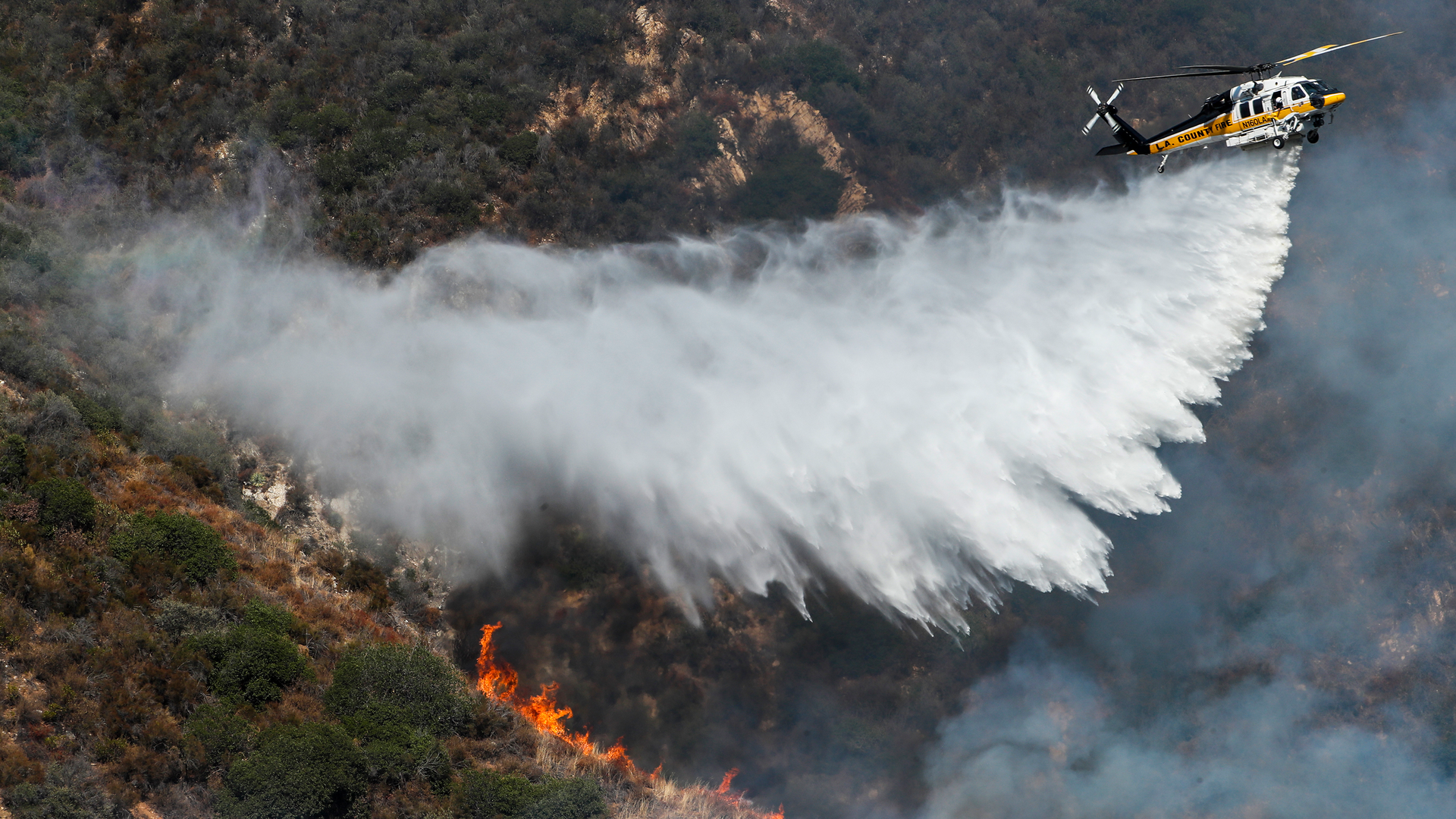 Los Angeles County fire resources battle a brush in August 2022.