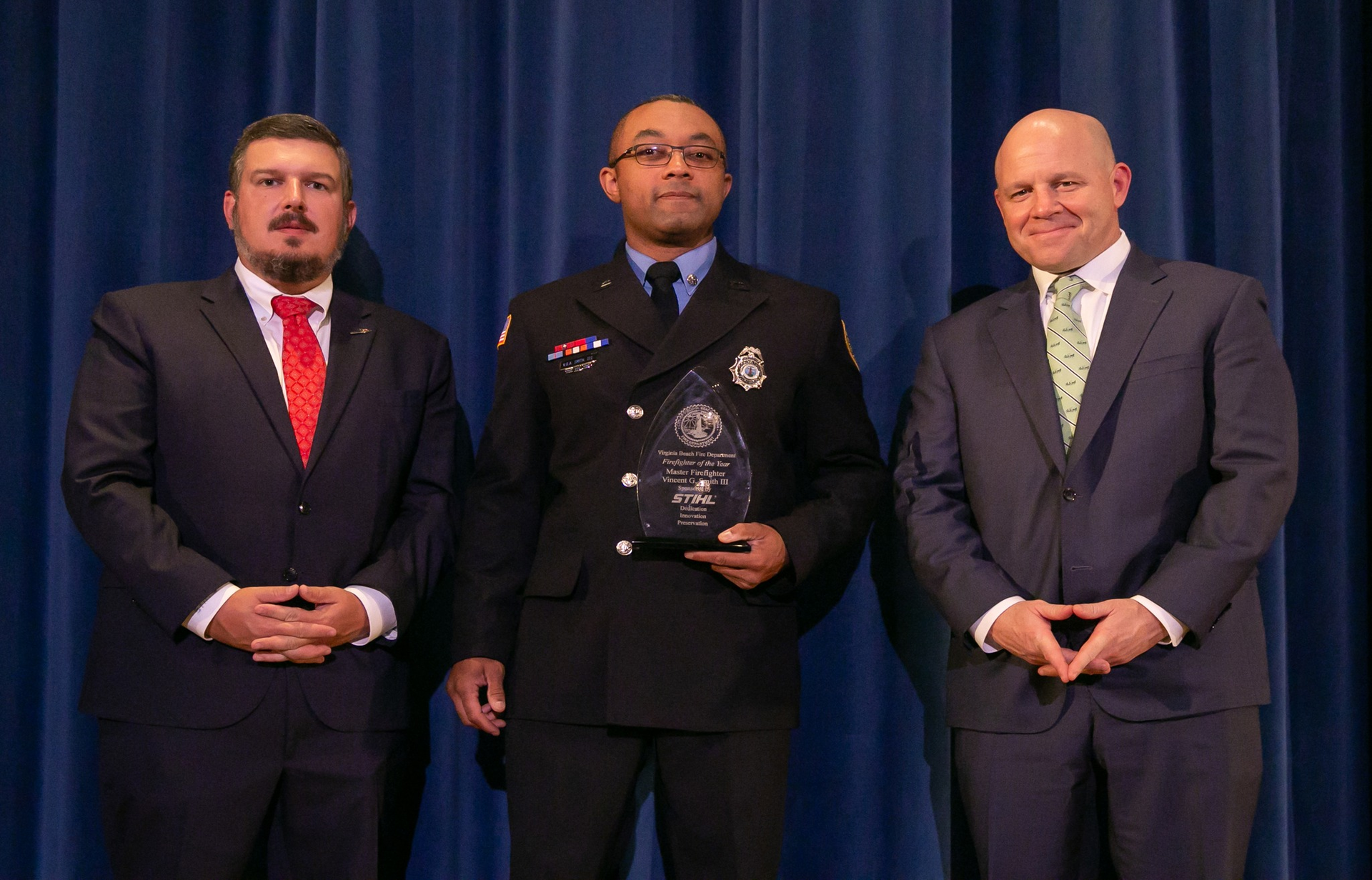 STIHL Inc. Product Manager John Allen, STIHL 2022 Firefighter of the Year Master Firefighter Vincent Smith III and STIHL Inc. Vice President of Sales & Marketing Chris Keffer.