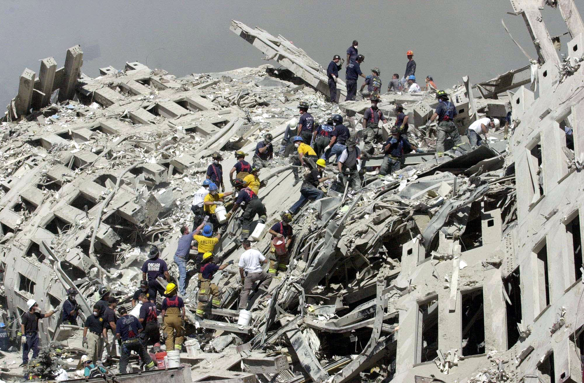 Firefighters work on the pile of the World Trade Center.
