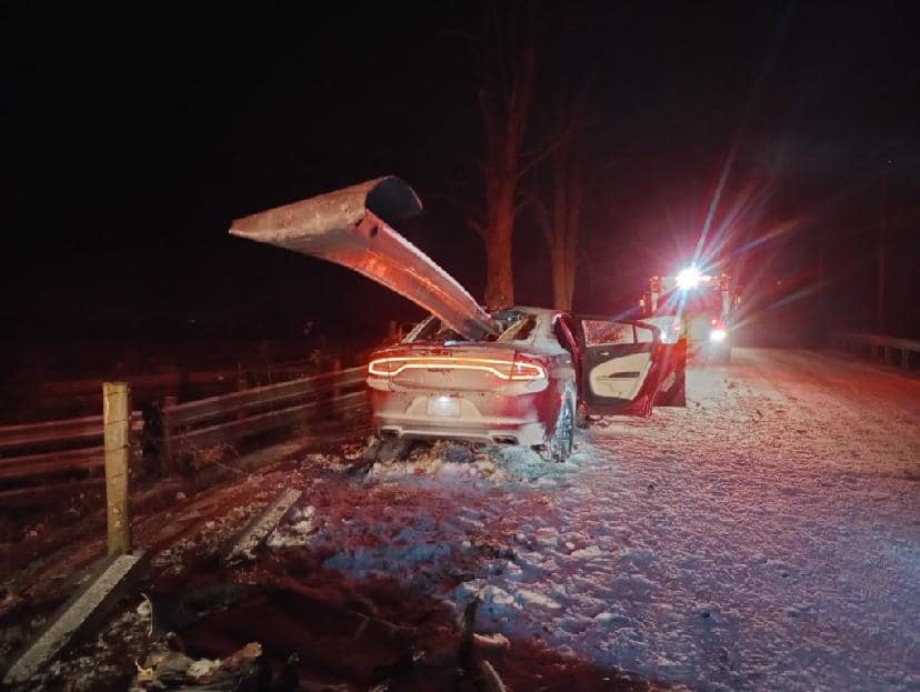 Motorists stopped and helped the occupants of this car.