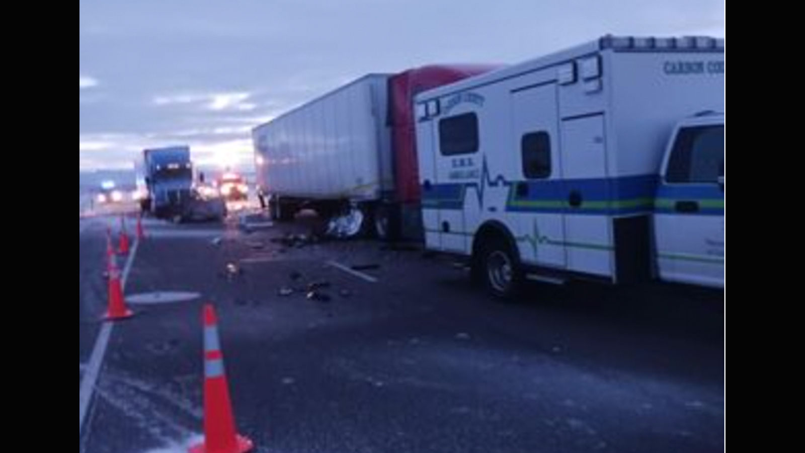 After striking the EMTs, the rig hit the ambulance.