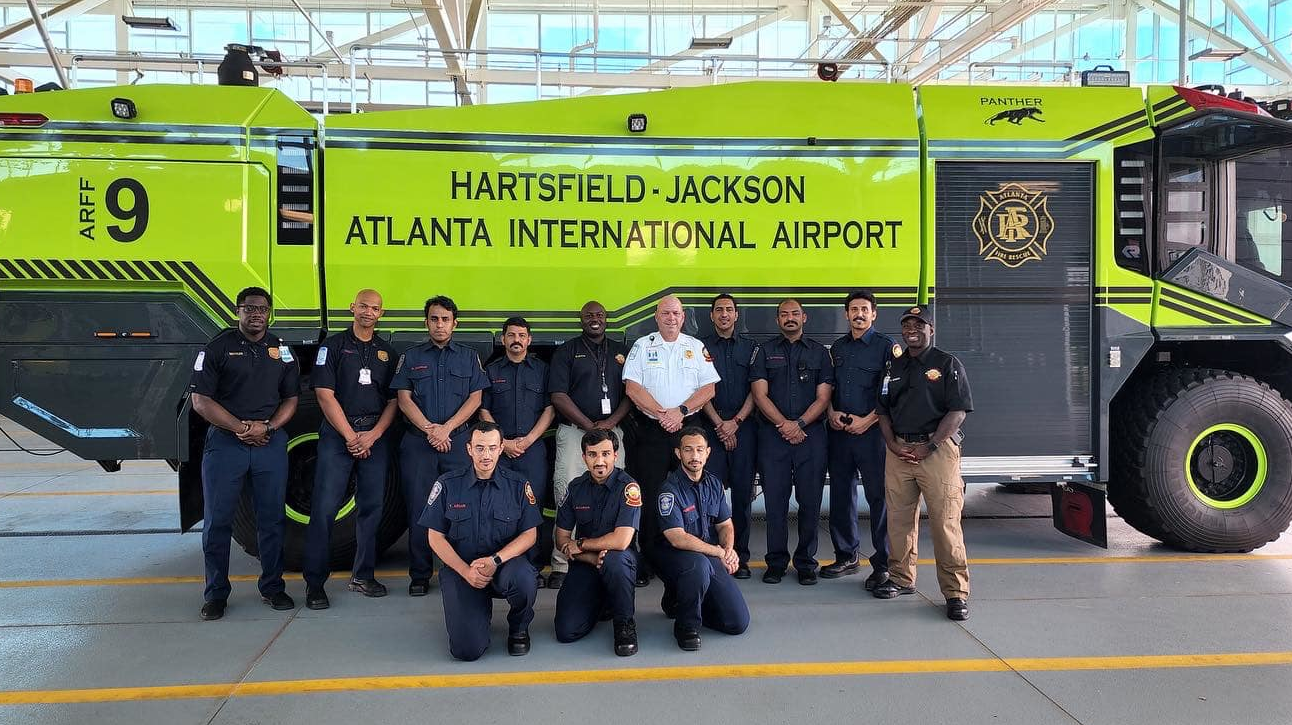 The cohort of Saudi Aramco firefighters who traveled to the United States in an August 2022 photo with Atlanta firefighters.