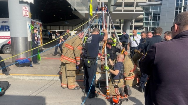 A Syracuse firefighter entered the sewer system on a rope to rescue the woman, who was injured and unable to climb up a ladder.