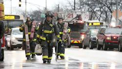 With elevators inoperable, Chicago firefighters had to haul gear up to the 27th floor. With elevators inoperable, Chicago firefighters had to haul gear up to the 27th floor.