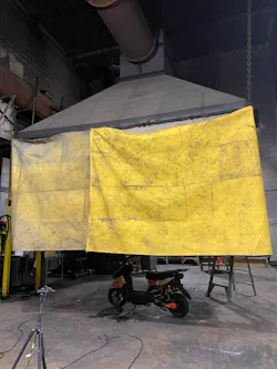 E-scooter in place under oxygen consumption calorimetry hood. E-scooter in place under oxygen consumption calorimetry hood.