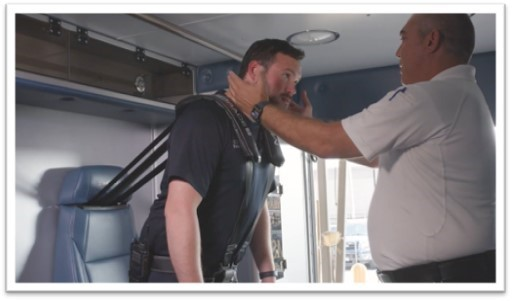 Cedric Palmisano, Deputy Chief of Special Ops & Logistics for New Orleans EMS, demonstrates MBrace&trade; to a paramedic.