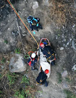 SORT team members and TFFD firefighters package a patient and prepare to lower the person to the bottom of the Snake River Canyon. SORT team members and TFFD firefighters package a patient and prepare to lower the person to the bottom of the Snake River Canyon.