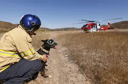San Diego Fire Rescue Medic Chad Arberg sits with Cory before climbing into the helicopter. San Diego Fire Rescue Medic Chad Arberg sits with Cory before climbing into the helicopter.