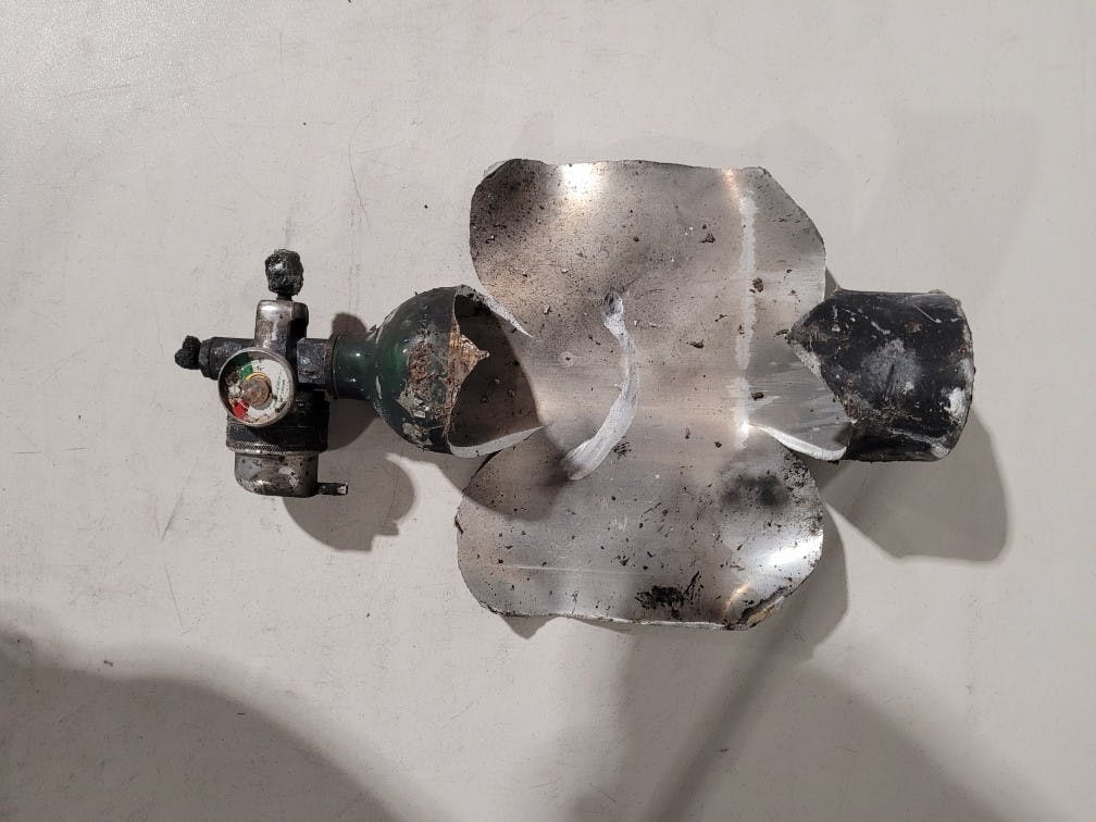 This oxygen bottle exploded as Ocala firefighters entered a residence.