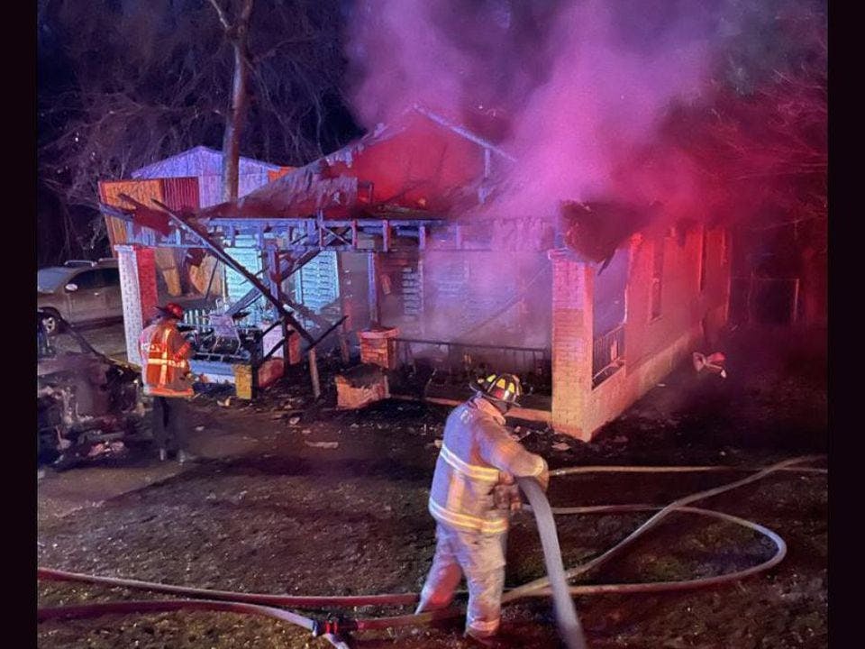 Birmingham firefighters rescued a man from this house fire.