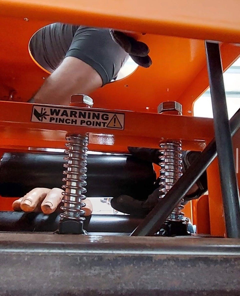 In the Black Box Machinery Simulator, you&rsquo;re able to work through multiple scenarios. Shown here, members tactfully are removing an upper roller to free the training hand.