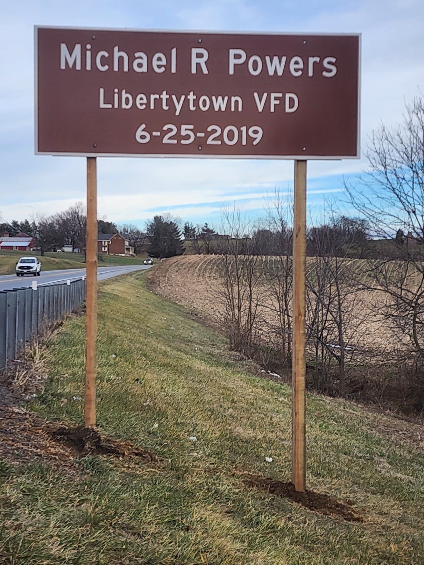 A section of MD. 26 has been dedicated to Libertytown Firefighter Michael R. Powers, who collapsed and died there.