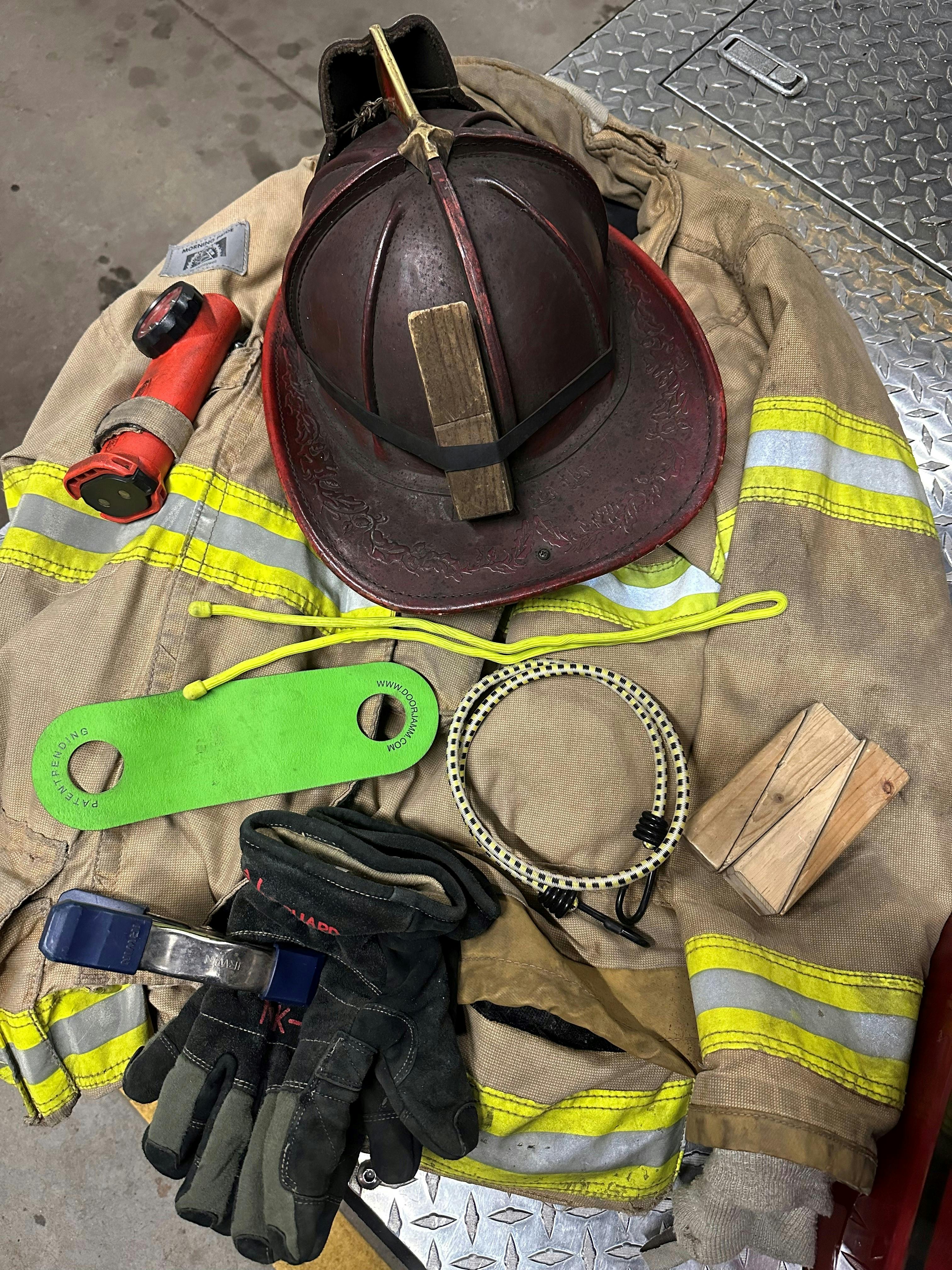 Chocks, spring clamps, latch straps, bungee cords and gear ties provide the means to secure doors in the open position when handlines are stretched.