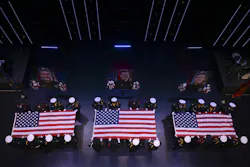 Honor guards fold the flags at the memorial service for the Burnsville firefighter and officers. Honor guards fold the flags at the memorial service for the Burnsville firefighter and officers.