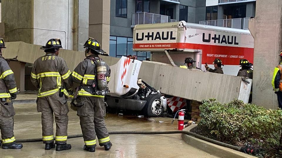 Using heavy-duty wreckers and extrication equipment, the beam was only lifted a few inches to free the driver.