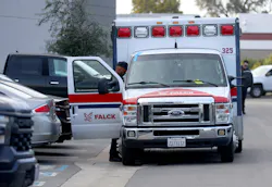 A Falck ambulance is checked out by EMS personnel. A Falck ambulance is checked out by EMS personnel.
