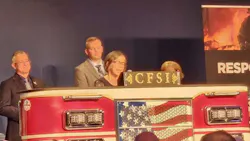 Dr. Denise Smith, the newly appointed director of the National Fire Research and Data Center, accepts the Senator Paul S. Sarbanes Fire Service Safety Leadership Award on behalf of the Skidmore College First Responder Health and Safety Laboratory. Dr. Denise Smith, the newly appointed director of the National Fire Research and Data Center, accepts the Senator Paul S. Sarbanes Fire Service Safety Leadership Award on behalf of the Skidmore College First Responder Health and Safety Laboratory.