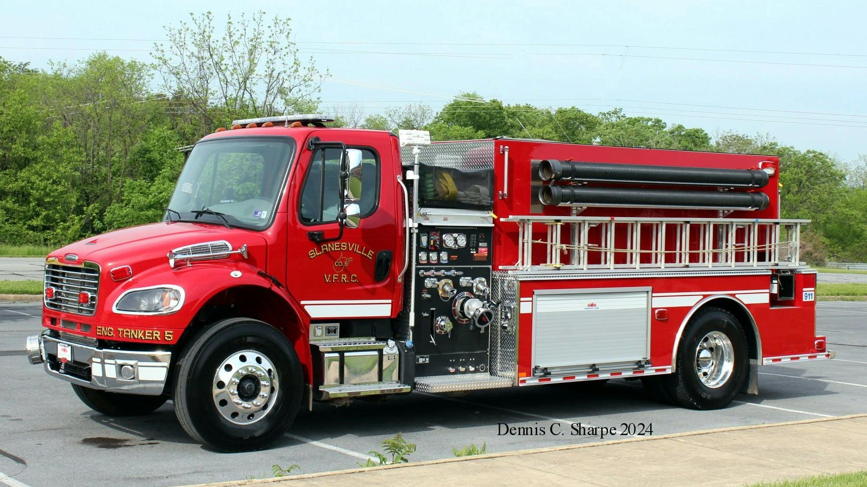 Midwest Fire built this pumper/tanker on a Freightliner chassis for the Slanesville Volunteer Fire Department. The rig is built on a Freightliner chassis with a two-door cab, powered by a Detroit Diesel engine and Allison EVS transmission.