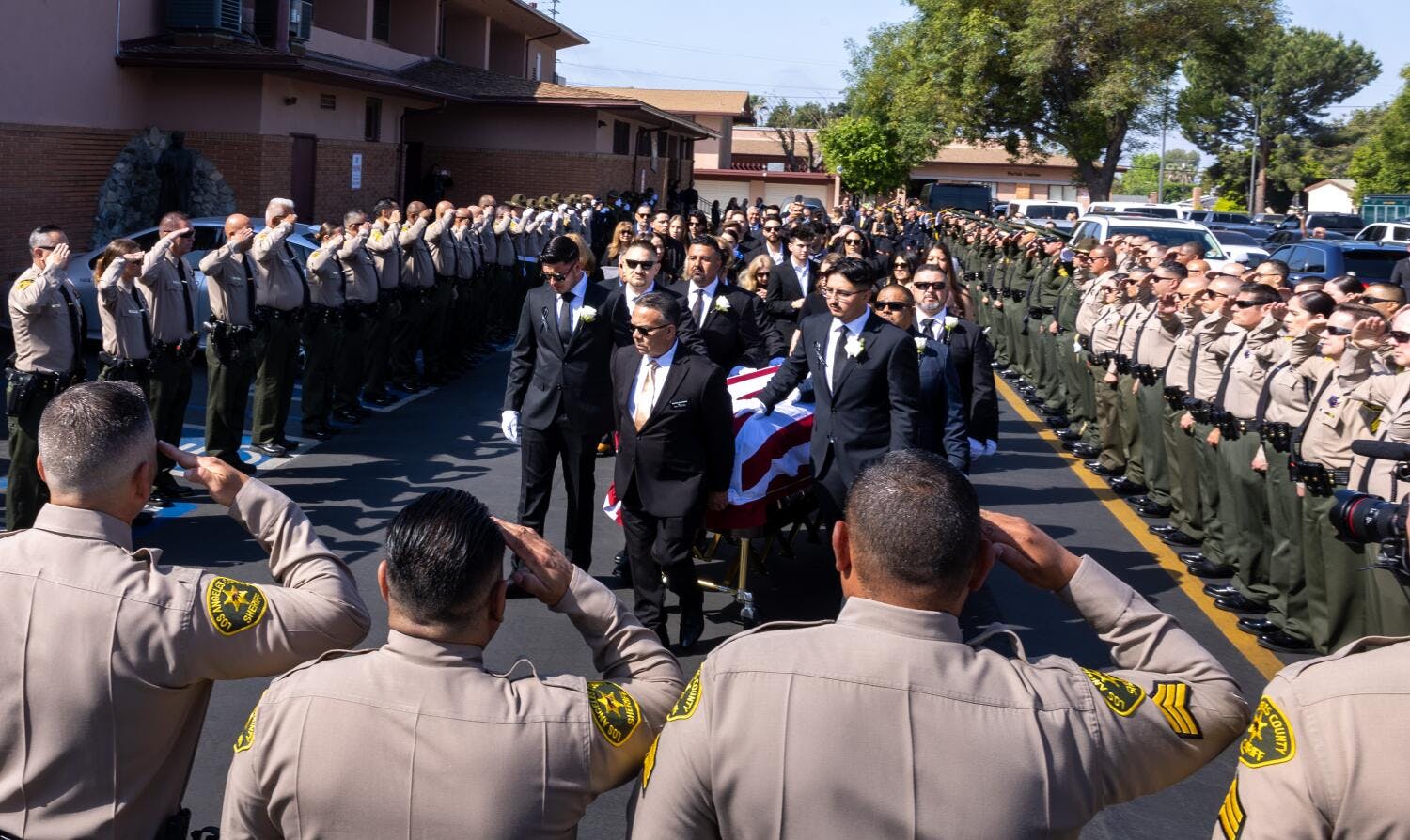 Colleagues saluted Los Angeles County Deputy Alfredo 'Freddy' Flores who died of injuries sustained in the fire.