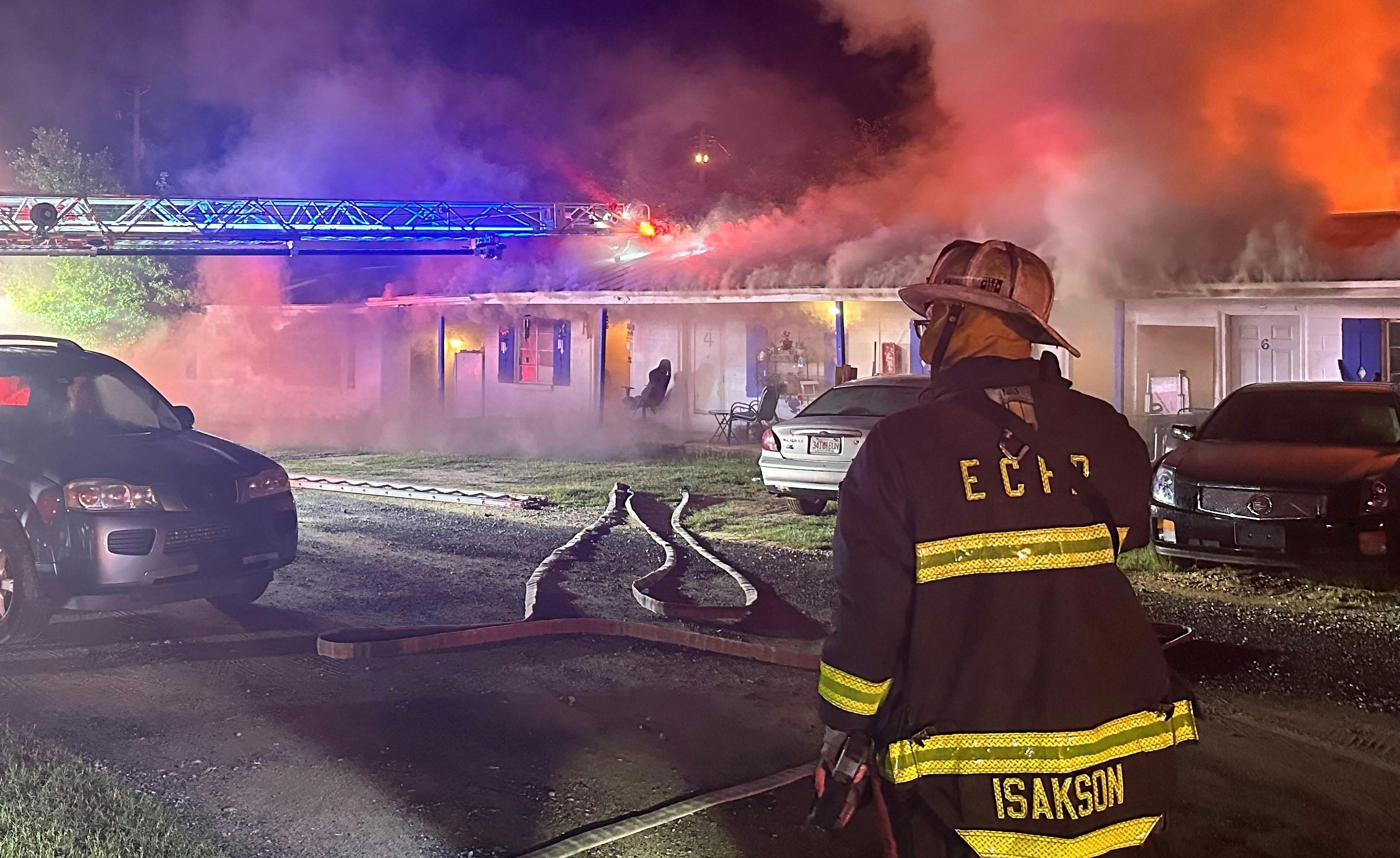 Among the challenges of a fire in a motel that was of a contiguous design that was converted to apartments was its width, which was larger than that of the average multifamily building and contributed to issues of accessing the rear of the building. The aerial ladder provided additional safety for roof operations (even on a one-story building) as well as a high point for a potential rescue.