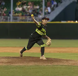 Mat Wolf, an Oklahoma City firefighters, takes the mound for his new team, The Firefighters. Mat Wolf, an Oklahoma City firefighters, takes the mound for his new team, The Firefighters.