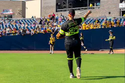 Head coach Valerie Perez warming up for her dual role as player and head coach. Head coach Valerie Perez warming up for her dual role as player and head coach.