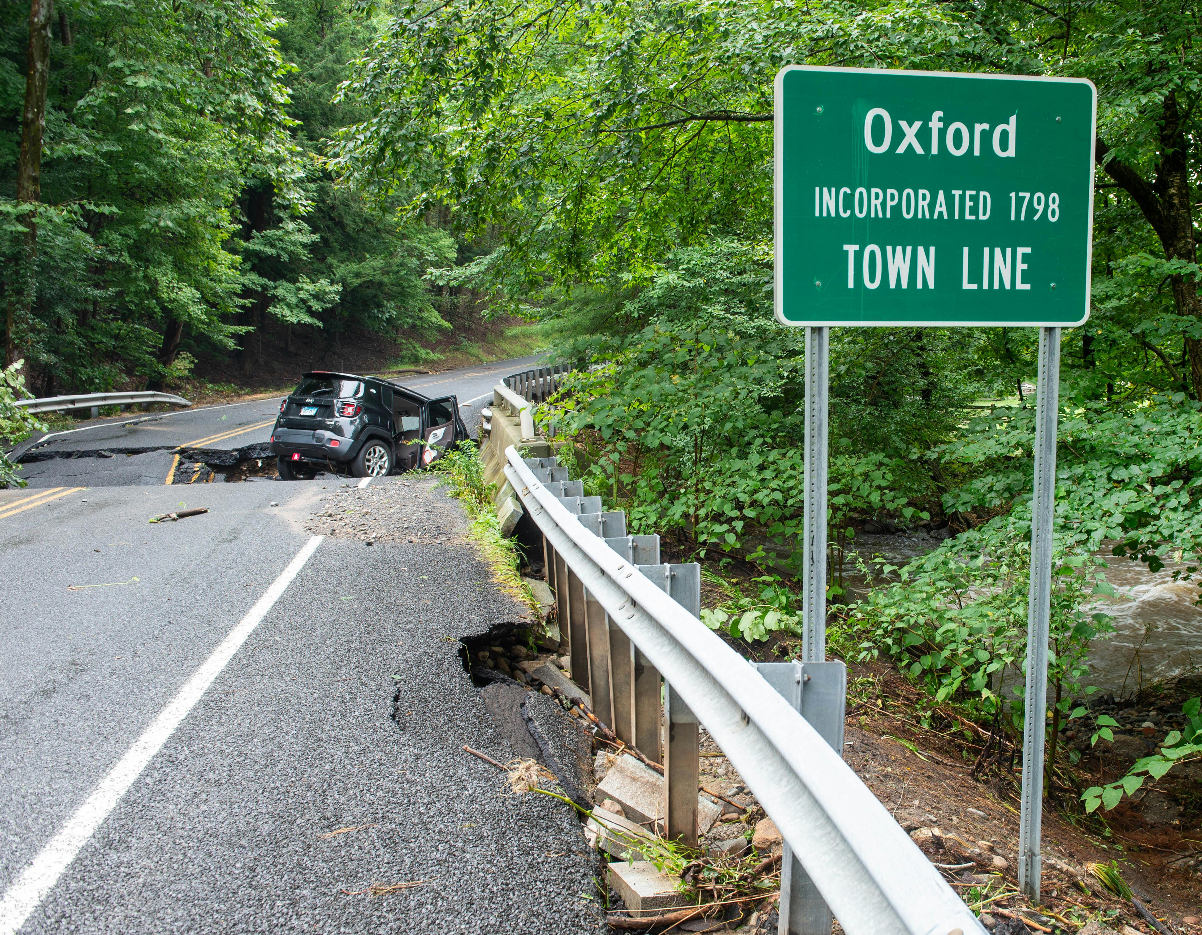 Firefighters who saved countless lives after a flood mourn the loss of two women.