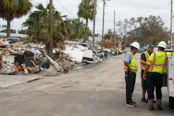 Florida Department of Transportation workers assess the damage to homes following Hurricane Helene. Florida Department of Transportation workers assess the damage to homes following Hurricane Helene.