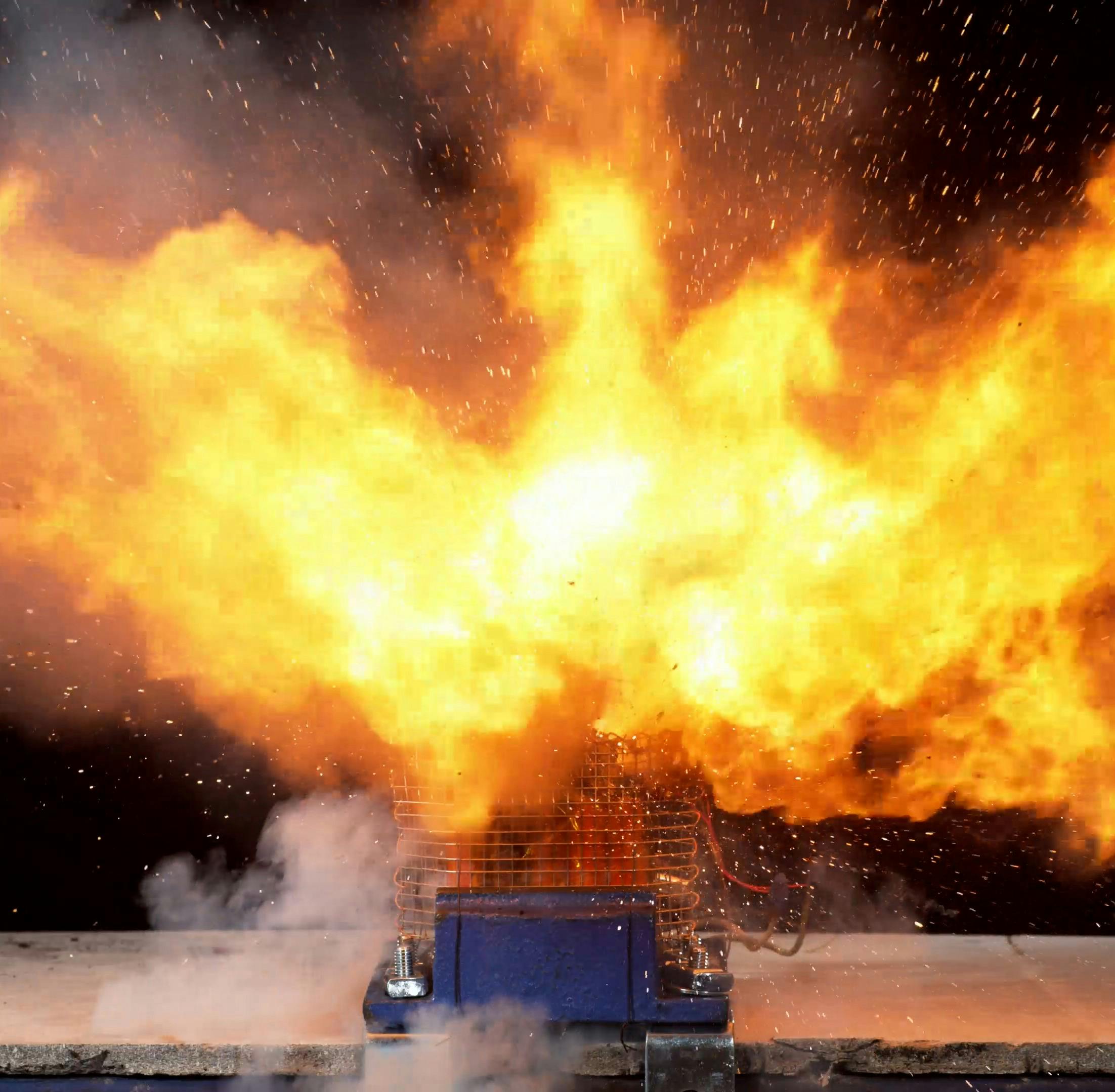 Figure 1. A 10-cell lithium nickel cobalt aluminum oxide (NCA) 18650 cell battery pack during its peak heat release rate (HRR).