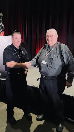 Bill Foster with an attendee of Spartan's Fire Truck Training Conference. Bill Foster with an attendee of Spartan's Fire Truck Training Conference.