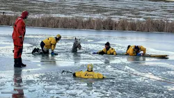 Firefighters donned ice rescue gear and used rope to get to the trapped horse. Firefighters donned ice rescue gear and used rope to get to the trapped horse.