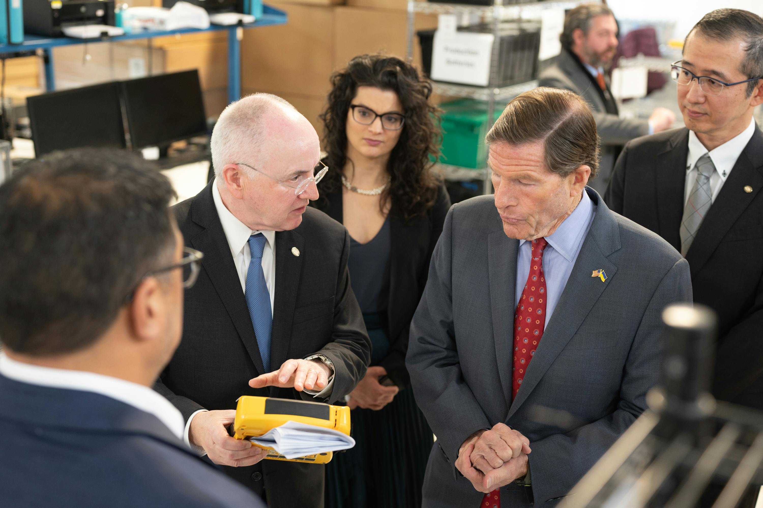 Defibtech welcomed Senator Richard Blumenthal (red tie) to their Branford, CT manufacturing facility to celebrate the company&rsquo;s recent &ldquo;E&rdquo; Award.