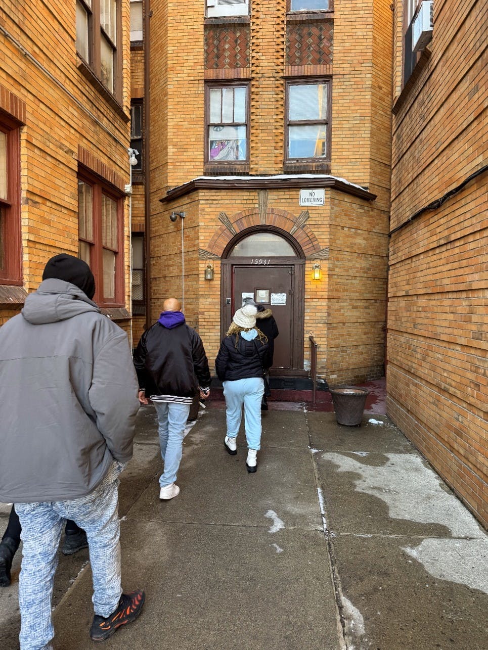 Detroit QRT members following up with an opioid overdose patient who declined transportation to a hospital after treatment by Detroit EMS.