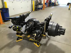 Suspension and brake components are attached to this single-rear-axle assembly, making it ready for installation on the vehicle chassis. Suspension and brake components are attached to this single-rear-axle assembly, making it ready for installation on the vehicle chassis.