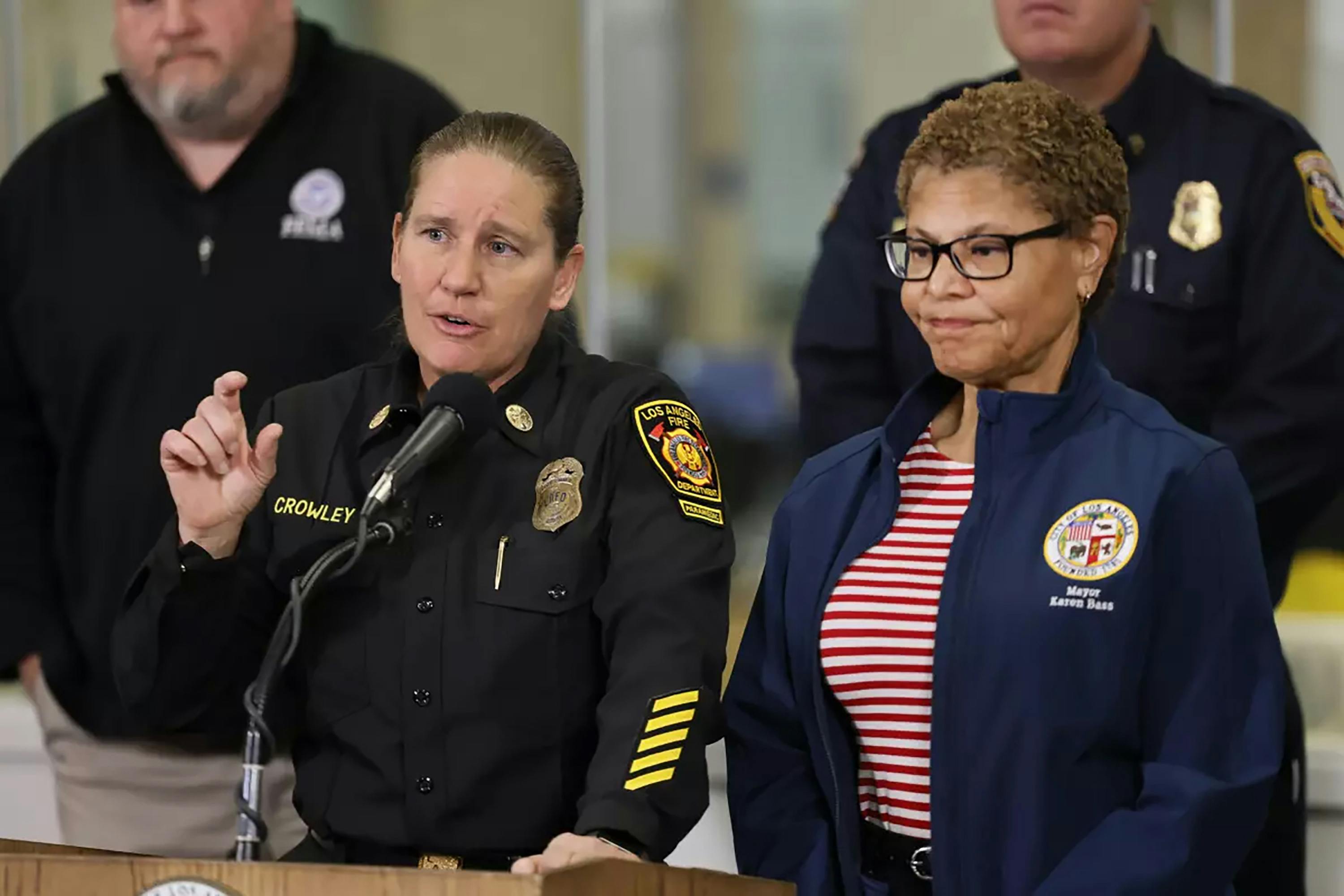 Los Angeles Mayor Karen Bass, right, and Los Angeles Fire Chief Kristin Crowley, address the media at a news conference last month