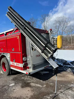 Once the Double Hard Sleeve Gantry is slid to the rear of the apparatus and then tilted upward at an approximate 45-degree angle, the hook and loop straps are released to access the sections of hard sleeve for deployment. Once the Double Hard Sleeve Gantry is slid to the rear of the apparatus and then tilted upward at an approximate 45-degree angle, the hook and loop straps are released to access the sections of hard sleeve for deployment.