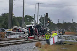 A Delray Beach ladder truck was hit by a train when the driver drove around the gates. A Delray Beach ladder truck was hit by a train when the driver drove around the gates.