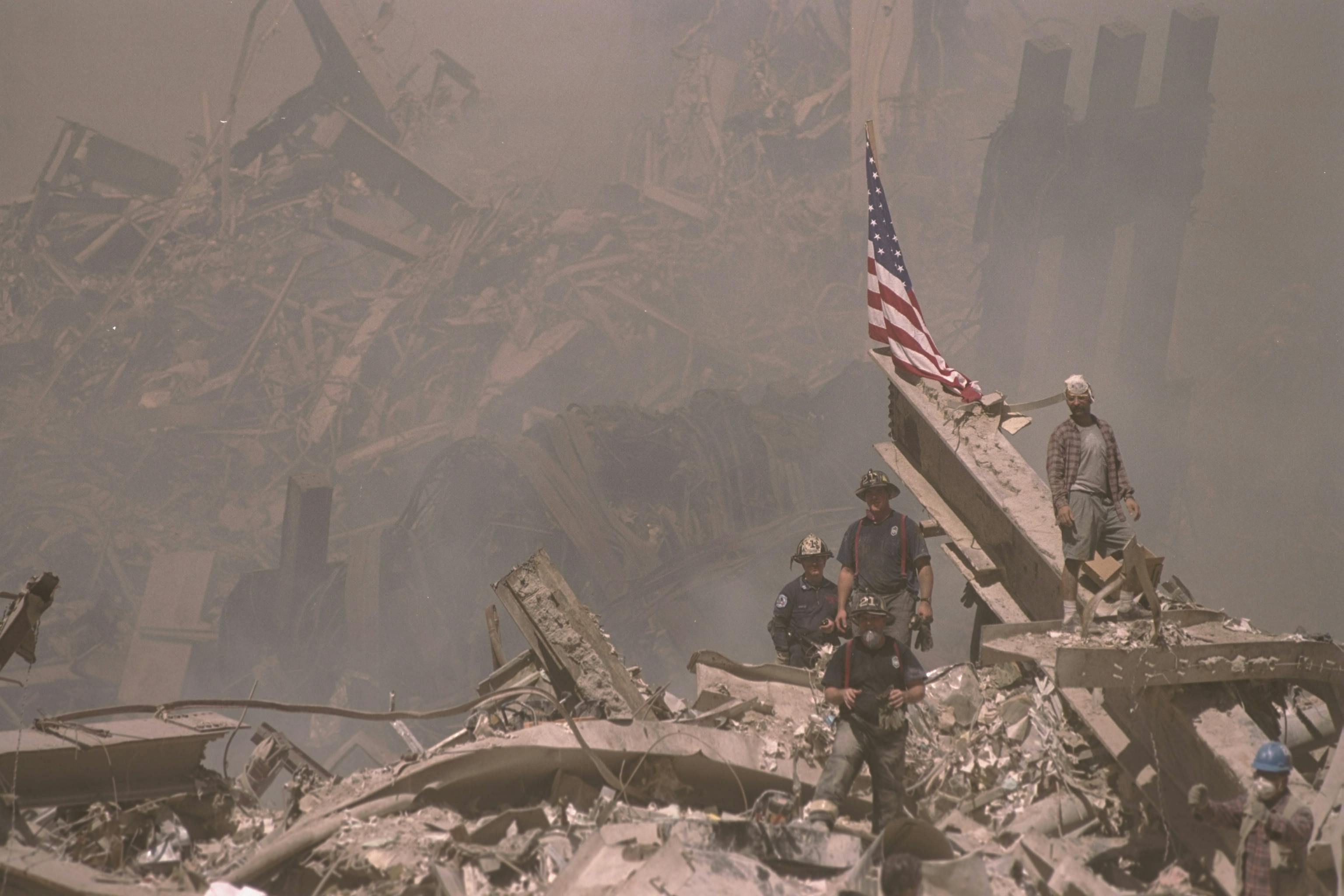 Firefighters work at the World Trade Center site.