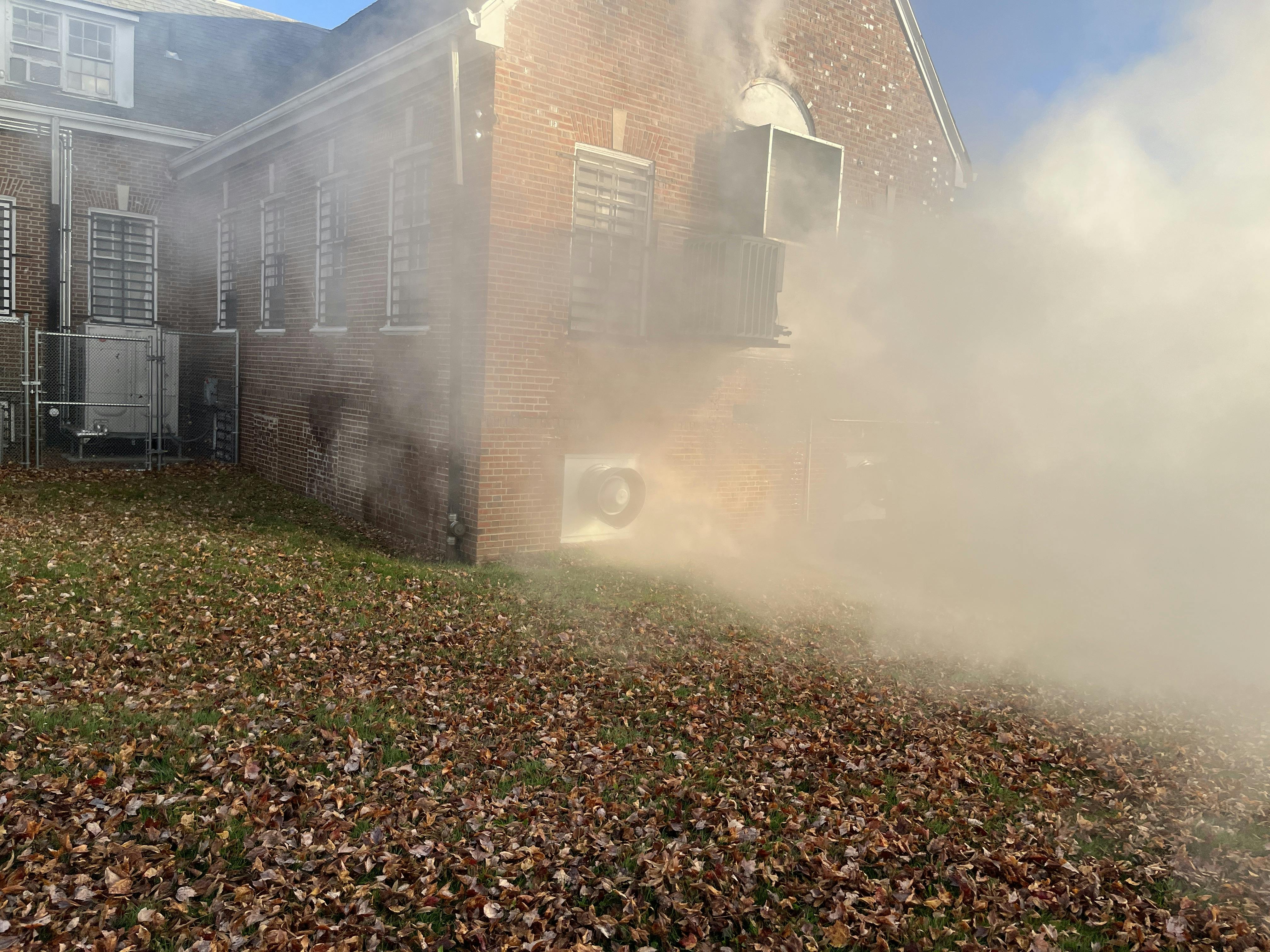 Initial-arriving crews must make a complete assessment of conditions of the entire incident, not just the front. Here, the bars that are on the windows immediately require another alarm to the assignment to deal with that hazard.