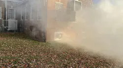 Initial-arriving crews must make a complete assessment of conditions of the entire incident, not just the front. Here, the bars that are on the windows immediately require another alarm to the assignment to deal with that hazard. Initial-arriving crews must make a complete assessment of conditions of the entire incident, not just the front. Here, the bars that are on the windows immediately require another alarm to the assignment to deal with that hazard.