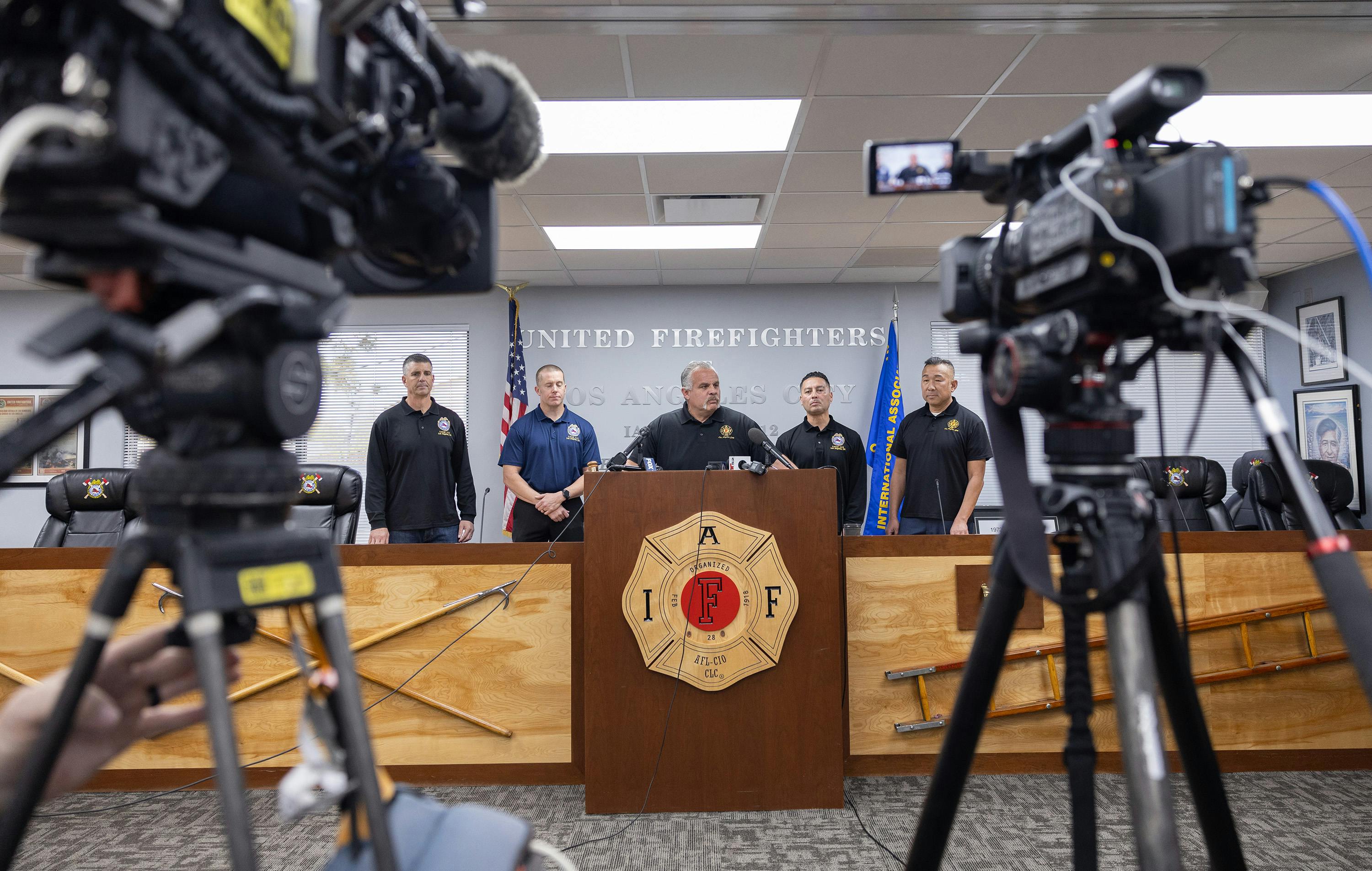 United Firefighters of Los Angeles City President Freddy Escobar speaks during a February 2025 press conference.