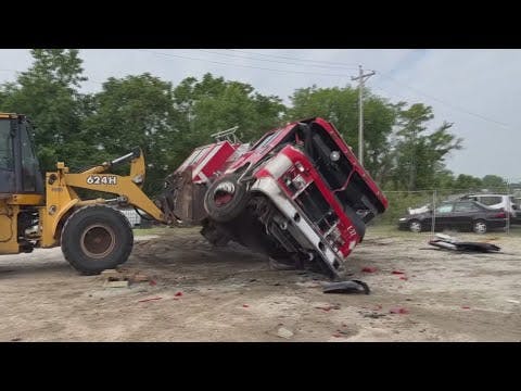 Rock Island firefighters send off old engine in simulated first responder crash