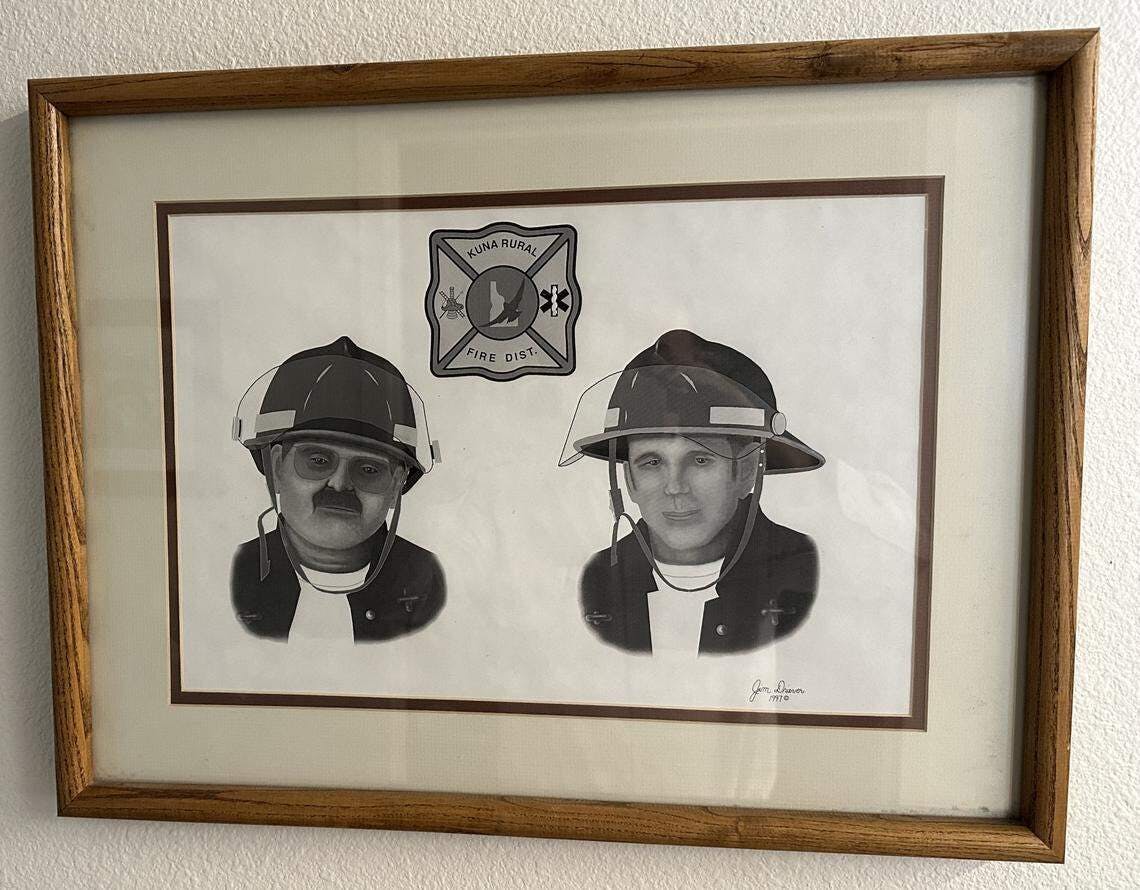 This portrait honoring Kuna firefighters Bill Buttram and Josh Oliver hangs in the Kuna fire station.