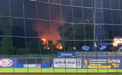 Fireworks ignited a brush fire outside the stadium last month. Fireworks ignited a brush fire outside the stadium last month.