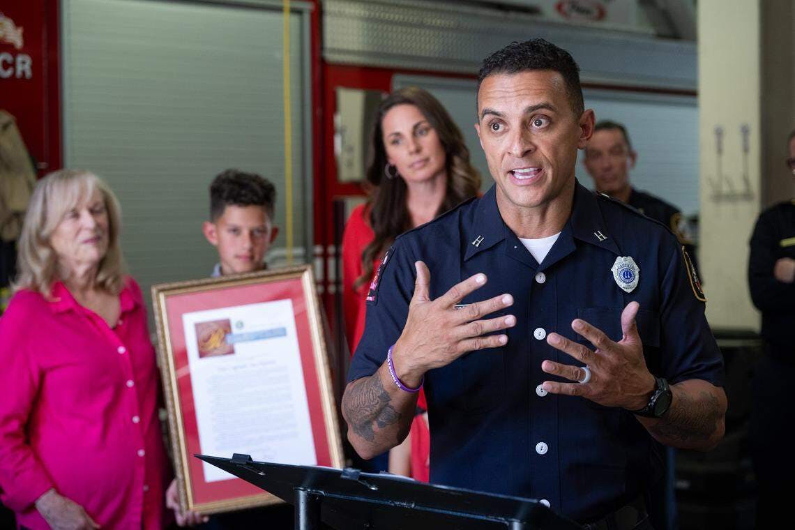 Sacramento Fire Capt. Joe Hunter, joined by his family, was honored by the city of Sacramento and the California Senate during a ceremony at Fire Station No. 2.