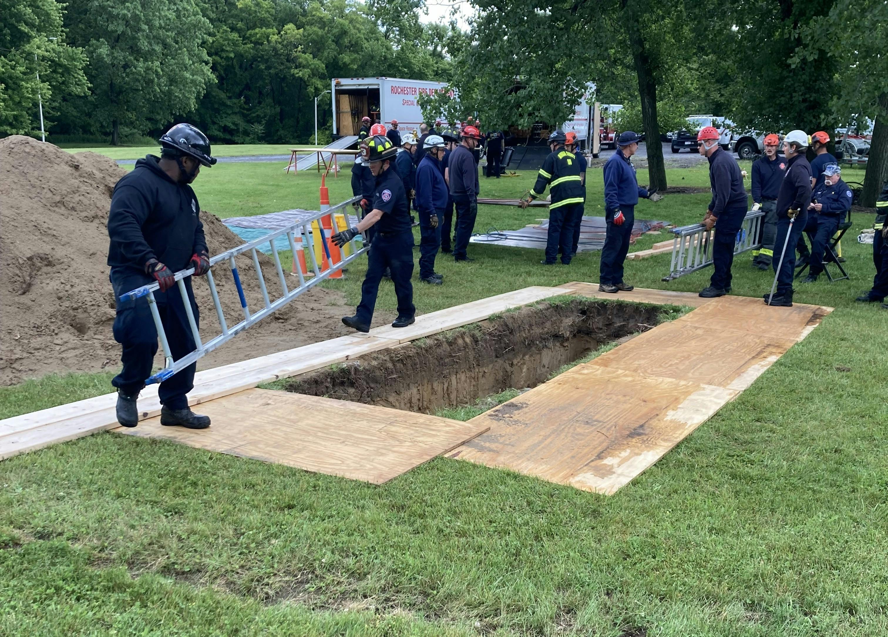 Making the lip on the trench safe and placing/moving ladders are key tasks that members of first-arriving companies can assist with under the guidance of a technical rescue team member. This safely engages the first-arriving companies and frees up technical rescue team members for more technical tasks.