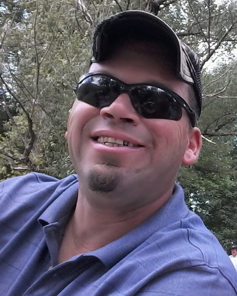 East Branch Assistant Chief Jason McGlone was electrocuted in July after responding to a vehicle crash. The driver has since been charged with manslaughter.