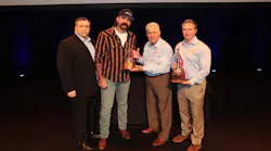 Michael O. McNamee Award of Valor honoree Jake Ryks (second from left) is joined by Firehouse's Peter Matthews (left) and Robert Daus Sr. (second from right) and Robert Daus Jr. (right) from Liberty Artworks, who presented their hand crafted award to Ryks. Michael O. McNamee Award of Valor honoree Jake Ryks (second from left) is joined by Firehouse's Peter Matthews (left) and Robert Daus Sr. (second from right) and Robert Daus Jr. (right) from Liberty Artworks, who presented their hand crafted award to Ryks.