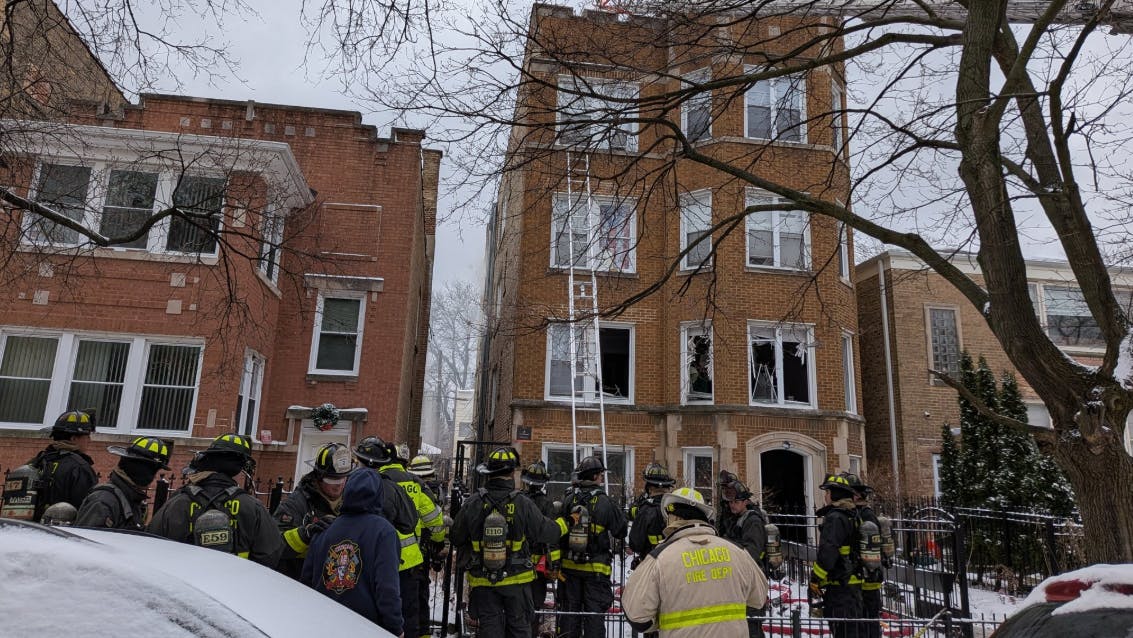 Chicago police shared a bulletin of a person of interest following the Rogers Park fire that claimed the life of firefighter Michael Altman.